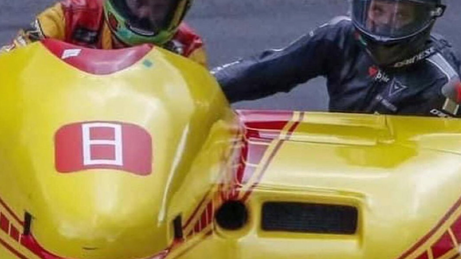 Guy tries out a motorcycle sidecar